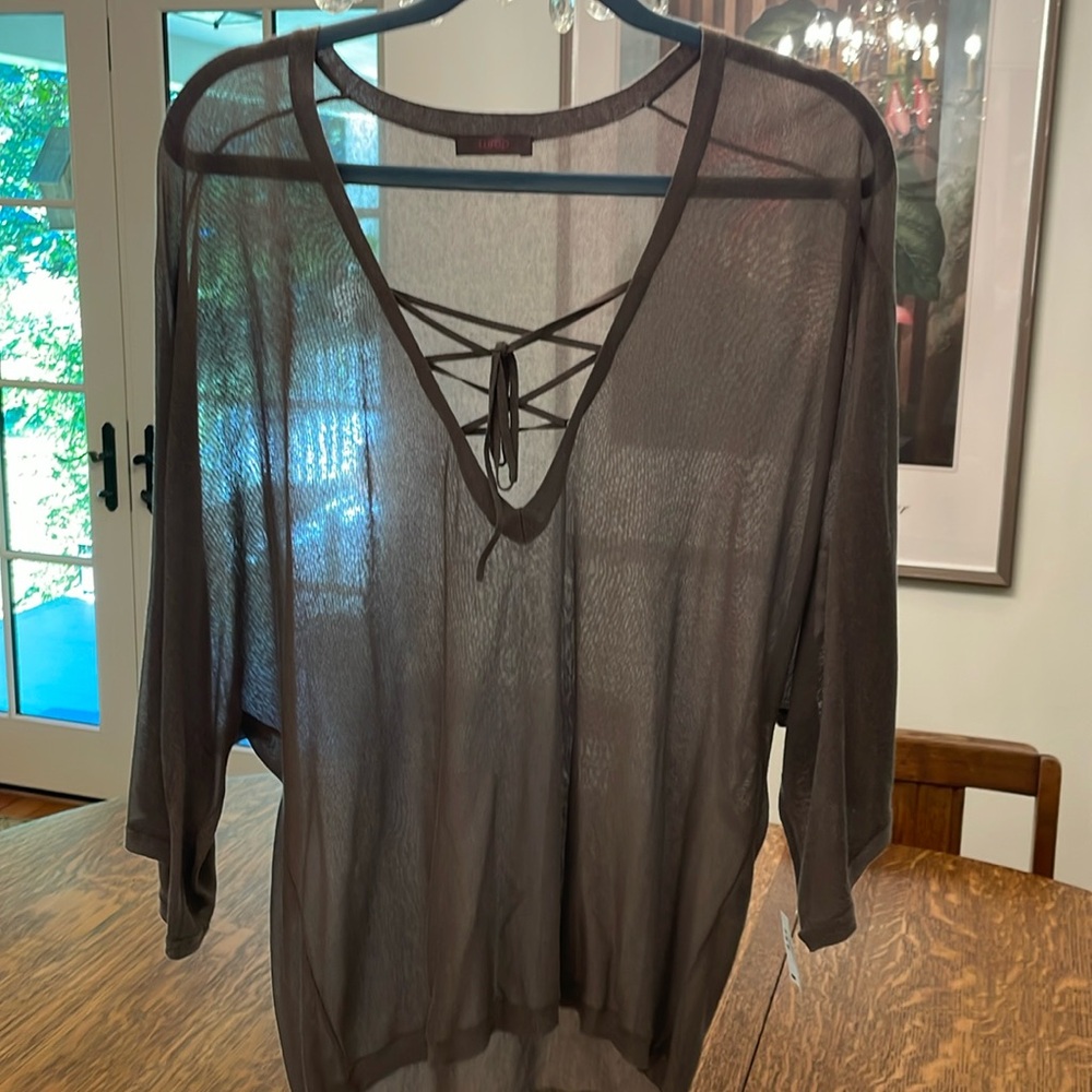 New with tags. Wrap brown sheer top.